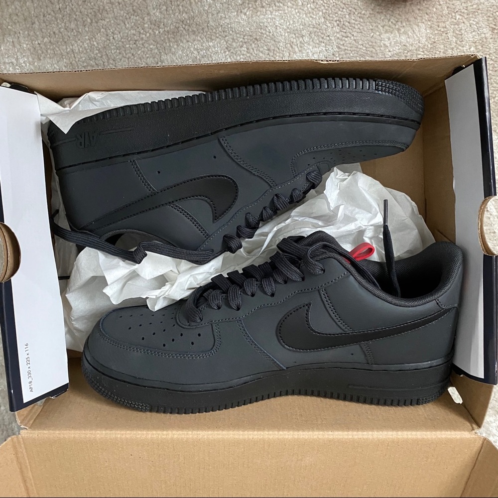 Air Force 1s. Black w/ red on tongue & heel NIB